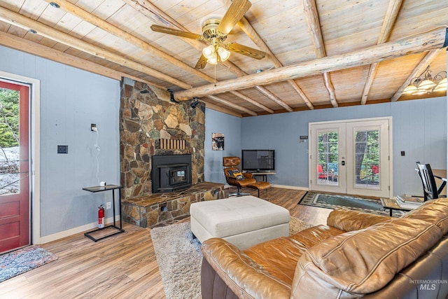 995 Cedar Crest Dr, Mccall, ID 83638 - living area with light wood finished floors, french doors, a ceiling fan, baseboards, and wooden ceiling