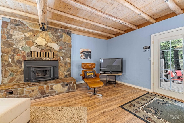 995 Cedar Crest Dr, Mccall, ID 83638 - living room with wood ceiling, wood finished floors, baseboards, and beamed ceiling
