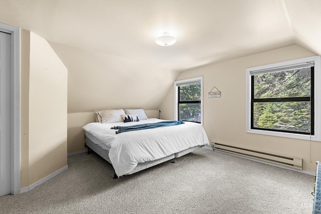 995 Cedar Crest Dr, Mccall, ID 83638 - carpeted bedroom with a baseboard radiator, lofted ceiling, and baseboards