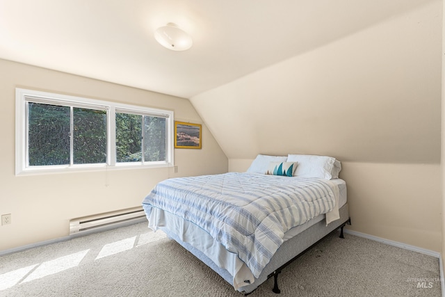 995 Cedar Crest Dr, Mccall, ID 83638 - carpeted bedroom featuring a baseboard heating unit, lofted ceiling, and baseboards