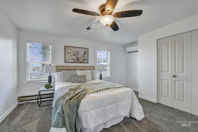 240 W Valley Rd, Hagerman, ID 83332 - carpeted bedroom with a baseboard heating unit, a wall mounted AC, a closet, and baseboards