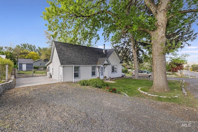 240 W Valley Rd, Hagerman, ID 83332 - view of front of house featuring driveway and roof with shingles