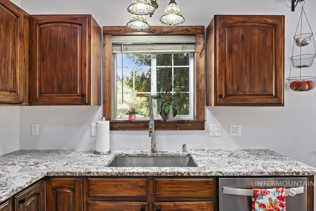 1010 N Hidden Pine Rd, Pine, ID 83647 - kitchen featuring dishwasher, a sink, and light stone countertops