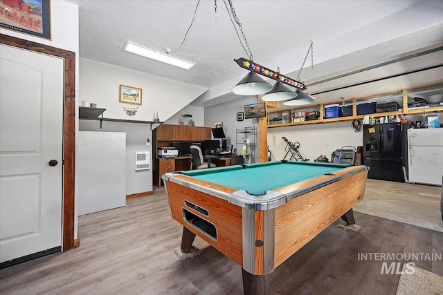 1010 N Hidden Pine Rd, Pine, ID 83647 - recreation room with pool table and wood finished floors
