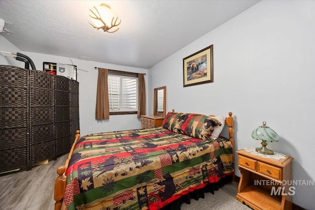 1010 N Hidden Pine Rd, Pine, ID 83647 - bedroom with wood finished floors