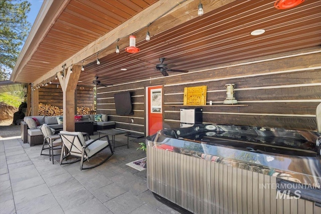 1010 N Hidden Pine Rd, Pine, ID 83647 - view of patio featuring an outdoor living space, ceiling fan, and a hot tub