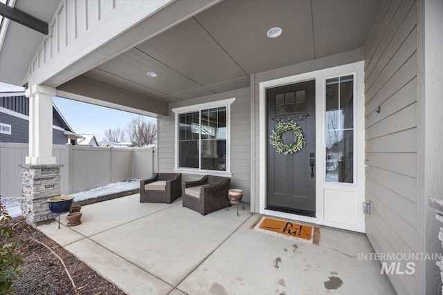 property entrance with covered porch