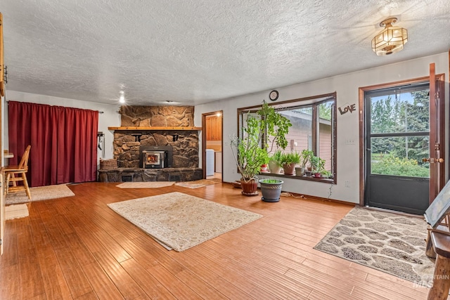 4 N 100 W, Fairfield, ID 83327 - living room featuring a textured ceiling and wood finished floors