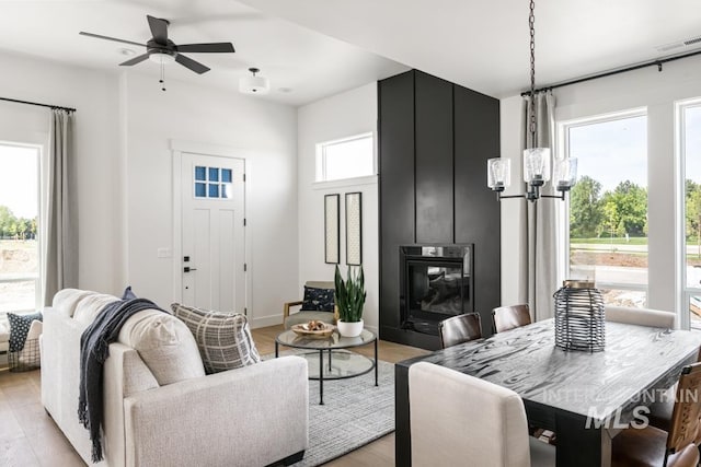 2005 W Freya Ct, Eagle, ID 83616 - living room with light wood finished floors and ceiling fan