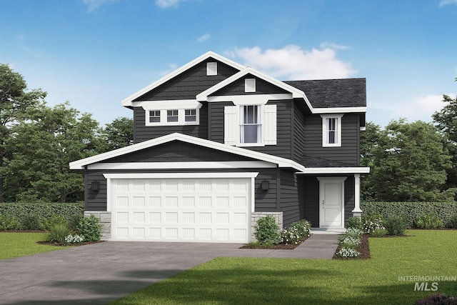 view of front facade with a garage and a front lawn