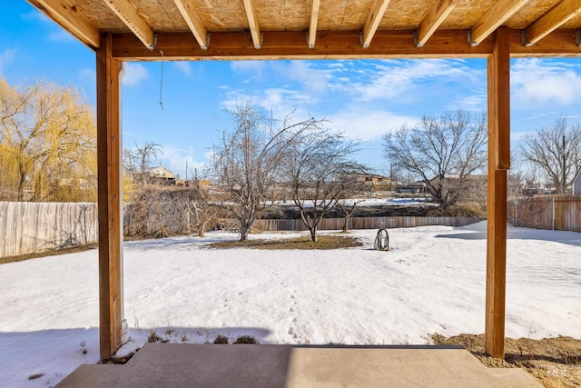 view of yard covered in snow