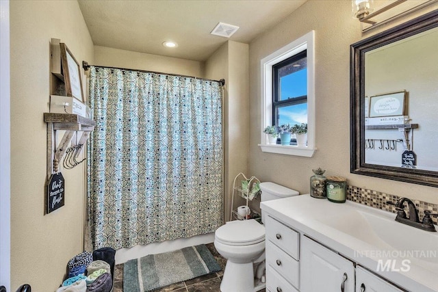 3976 Ranch Ln, Emmett, ID 83617 - full bathroom featuring tile patterned floors, a shower with curtain, toilet, visible vents, and vanity