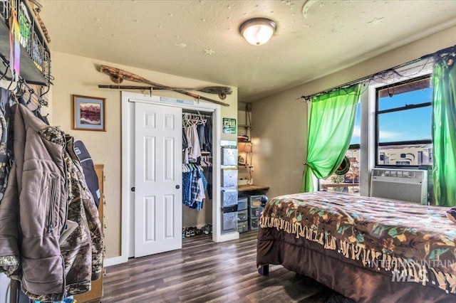 3976 Ranch Ln, Emmett, ID 83617 - bedroom featuring wood finished floors, a closet, and cooling unit