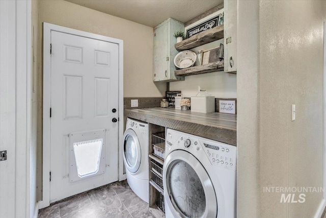 3976 Ranch Ln, Emmett, ID 83617 - washroom with cabinet space, marble finish floor, and separate washer and dryer