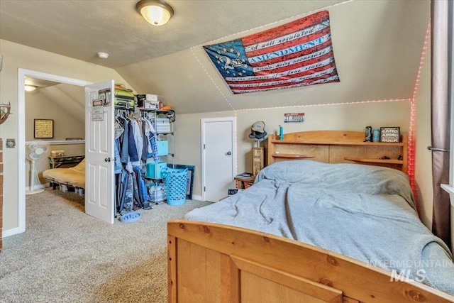 3976 Ranch Ln, Emmett, ID 83617 - carpeted bedroom with vaulted ceiling and baseboards