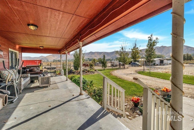3976 Ranch Ln, Emmett, ID 83617 - view of patio / terrace featuring covered porch and a mountain view