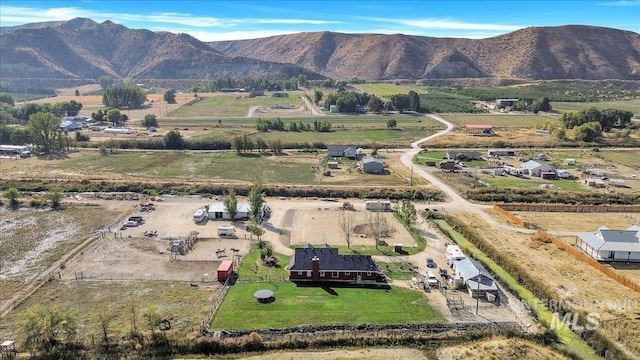 3976 Ranch Ln, Emmett, ID 83617 - drone / aerial view with a mountain view and a rural view