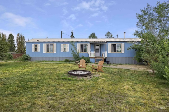 104 Poverty Ln, West Magic, ID 83352 - manufactured / mobile home featuring a front yard and a metal roof