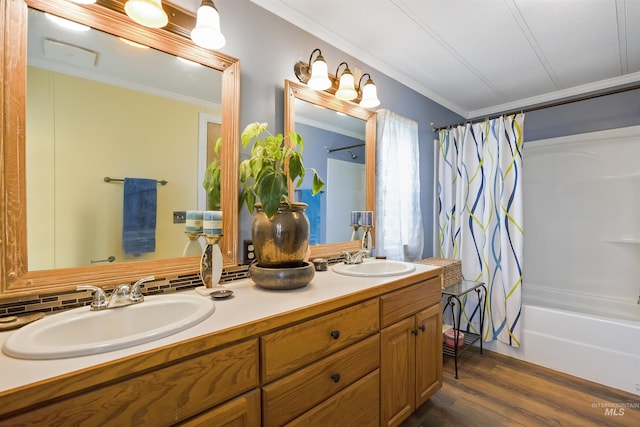 104 Poverty Ln, West Magic, ID 83352 - full bathroom with crown molding, double vanity, shower / bath combo, and wood finished floors