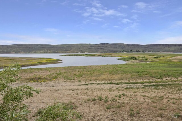 104 Poverty Ln, West Magic, ID 83352 - view of mountain backdrop featuring a nearby body of water