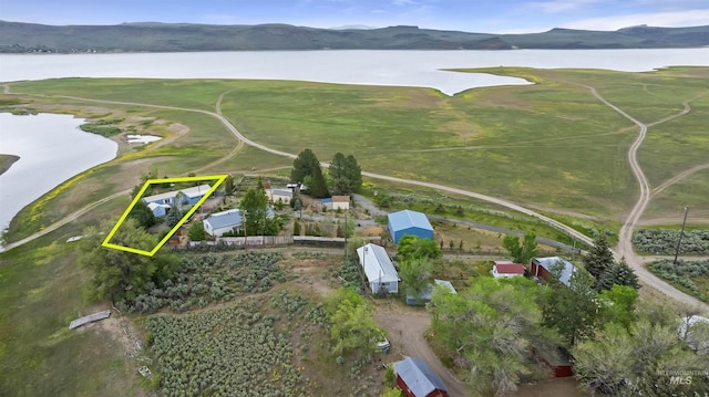 104 Poverty Ln, West Magic, ID 83352 - aerial overview of property's location featuring property boundaries highlighted and a water and mountain view