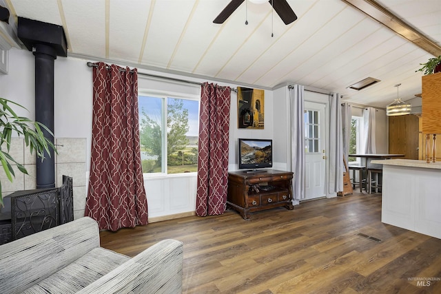 104 Poverty Ln, West Magic, ID 83352 - living area featuring ceiling fan, wood finished floors, and a wood stove