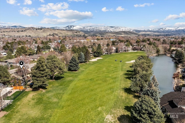 aerial view featuring a water and mountain view