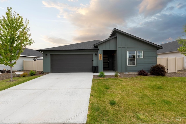 8408 E Dutchman St, Nampa, ID 83687 - view of front of home with a garage, board and batten siding, fence, and concrete driveway