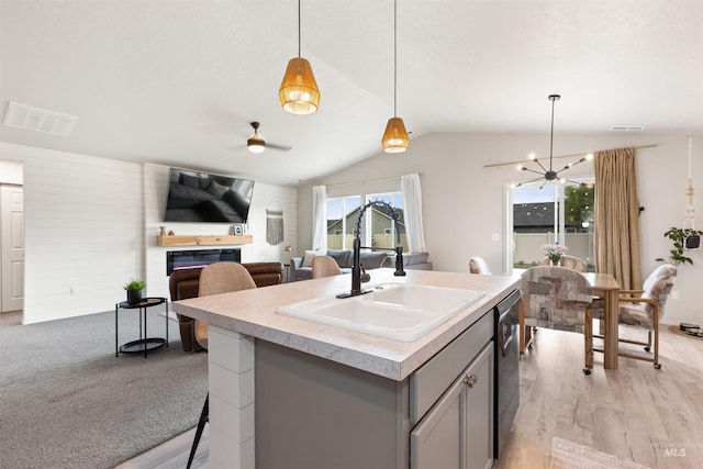 8408 E Dutchman St, Nampa, ID 83687 - kitchen featuring visible vents, open floor plan, ceiling fan, a sink, and gray cabinetry