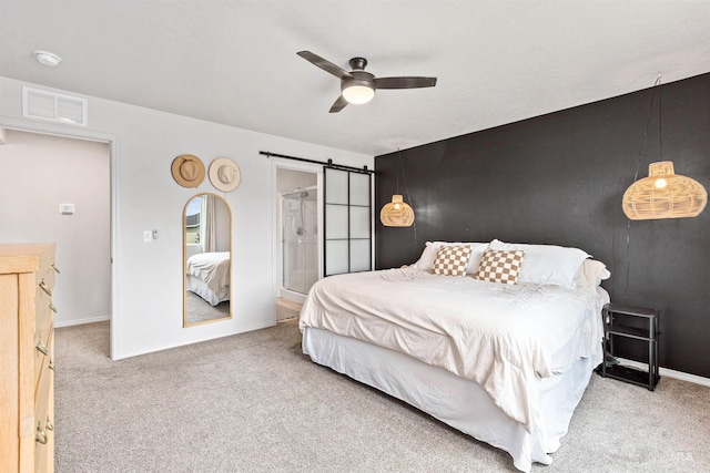 8408 E Dutchman St, Nampa, ID 83687 - bedroom featuring visible vents, baseboards, a barn door, a ceiling fan, and carpet
