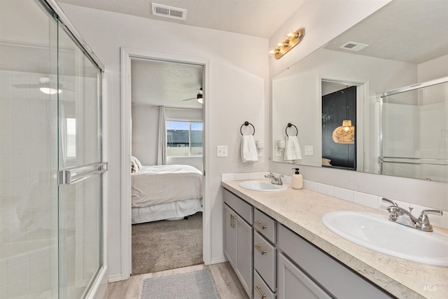 8408 E Dutchman St, Nampa, ID 83687 - ensuite bathroom with a sink, a shower stall, ensuite bath, and visible vents