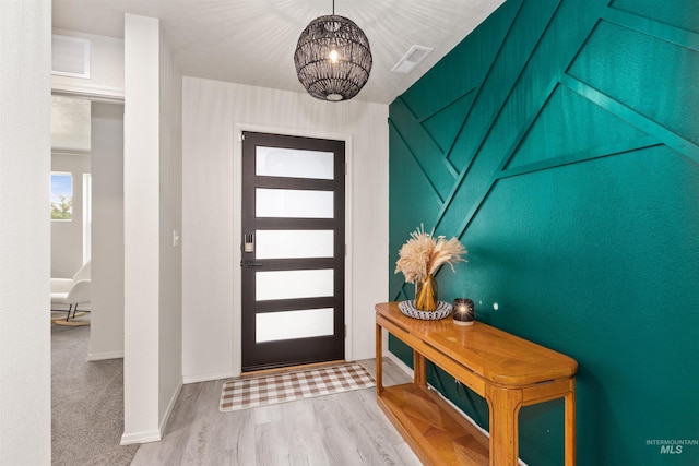 8408 E Dutchman St, Nampa, ID 83687 - interior space featuring baseboards, an inviting chandelier, and visible vents