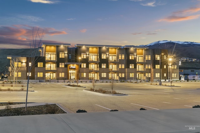 view of property at dusk