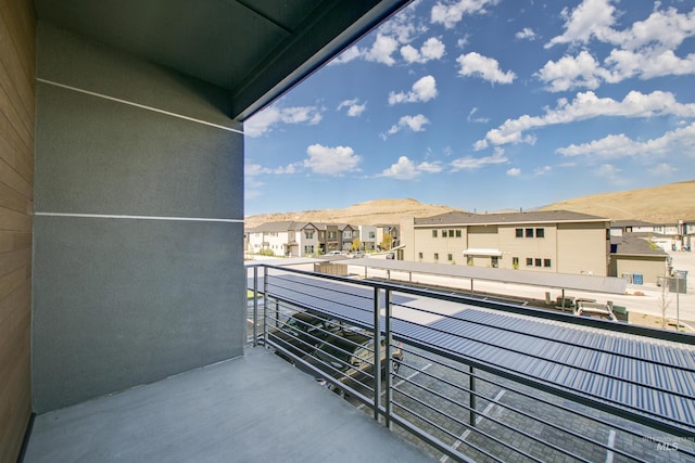balcony featuring a residential view