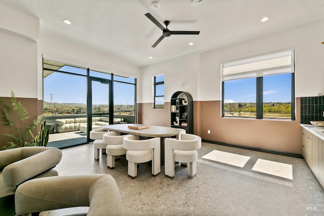 dining room featuring ceiling fan and recessed lighting