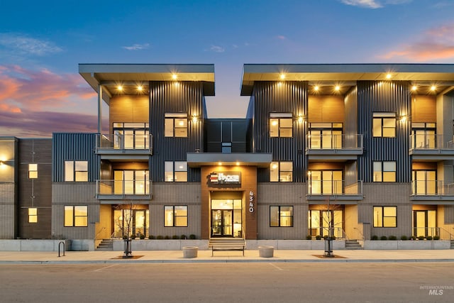 view of property at dusk