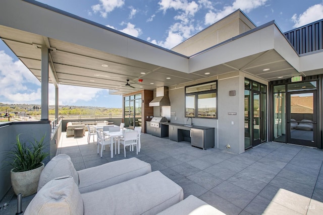 view of patio featuring grilling area, an outdoor living space, outdoor dining area, a sink, and an outdoor kitchen