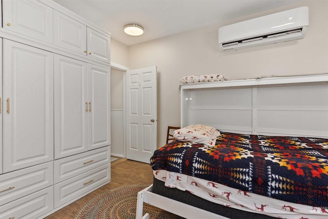 894 Main St, Star, ID 83669 - bedroom with an AC wall unit and light wood-style floors
