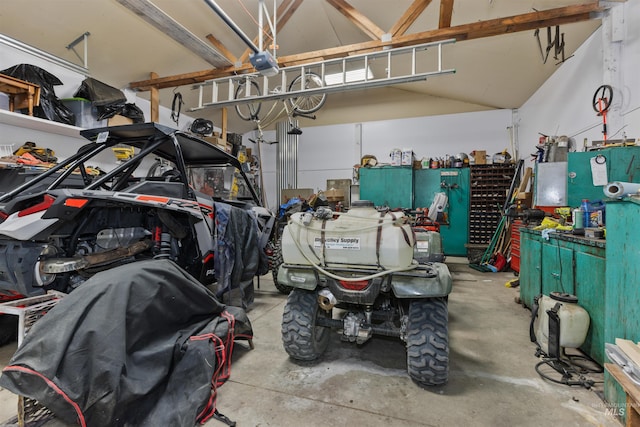 894 Main St, Star, ID 83669 - garage with a garage door opener and a workshop area
