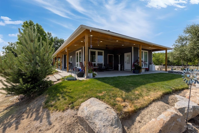 894 Main St, Star, ID 83669 - back of house with a patio, a lawn, and a ceiling fan