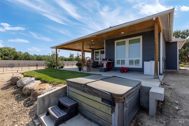 894 Main St, Star, ID 83669 - view of patio featuring a hot tub and a ceiling fan