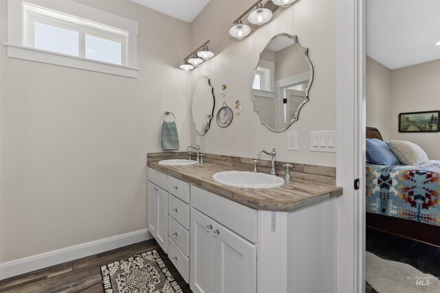 894 Main St, Star, ID 83669 - full bathroom featuring connected bathroom, wood finished floors, and double vanity