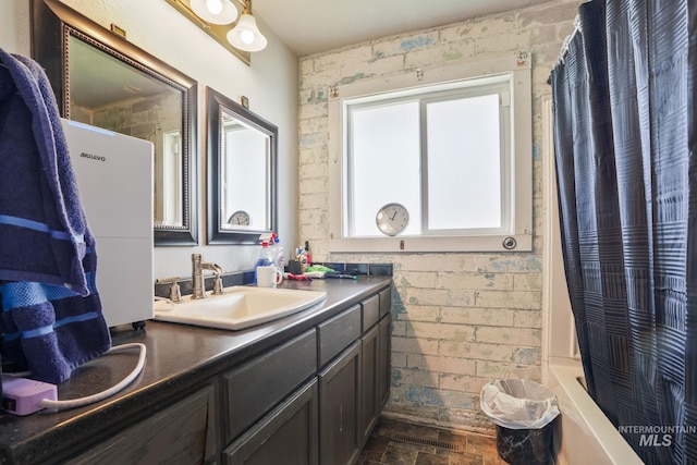909 Victoria Ave, Fruitland, ID 83619 - full bathroom with vanity and shower / bath combination with curtain