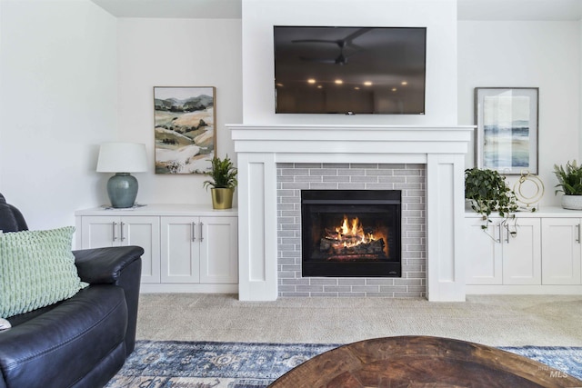 5916 S Wayland Way, Meridian, ID 83642 - carpeted living room featuring a lit fireplace