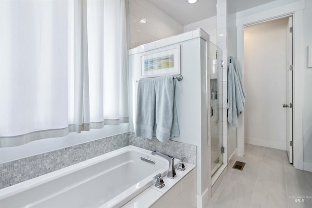 5916 S Wayland Way, Meridian, ID 83642 - bathroom featuring a shower stall and a bath