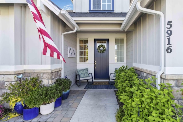 5916 S Wayland Way, Meridian, ID 83642 - entrance to property featuring board and batten siding, stone siding, and a porch