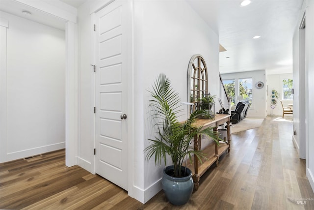 5916 S Wayland Way, Meridian, ID 83642 - hallway featuring baseboards, wood finished floors, and recessed lighting