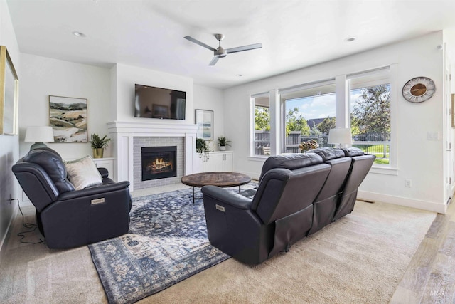 5916 S Wayland Way, Meridian, ID 83642 - living room with ceiling fan, a fireplace, baseboards, light wood-style flooring, and recessed lighting