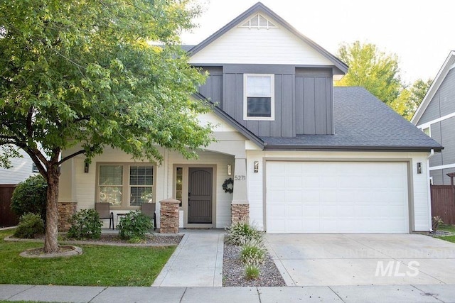 view of front of home featuring a garage and covered porch