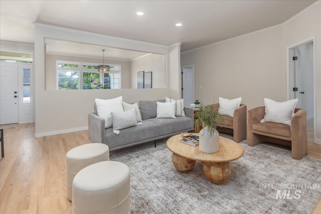 4975 N Morninggale Way, Boise, ID 83713 - living area with light wood-style flooring, ornamental molding, and recessed lighting